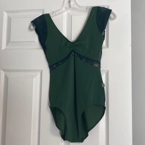 Class In adult small hunter green leotard with lace sleeves and back.
